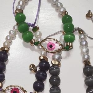 hand-woven bracelets made of natural stones with glass beads